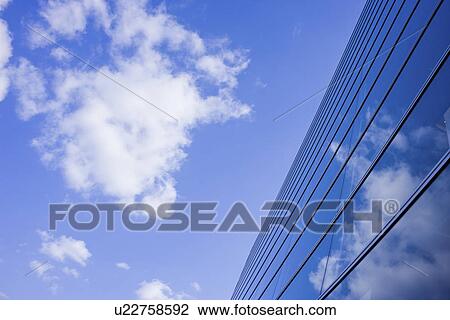 Stock Image - Office building under sky, Nishinomiya city, Hyogo prefecture, Japan. Fotosearch