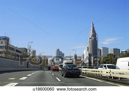 Stock Image - Office buildings and highway, Tokyo prefecture, Japan. Fotosearch
