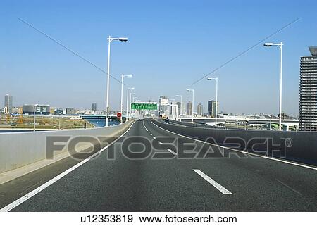 Stock Photo - Office buildings and highway, Tokyo prefecture, Japan. Fotosearch