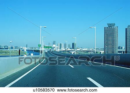 Stock Image - Office buildings and highway, toned image, Tokyo prefecture, Japan. Fotosearch