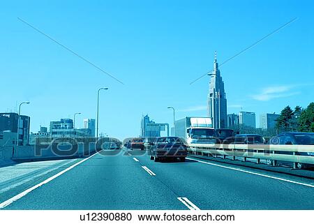 Stock Image - Office buildings and highway, toned image, Tokyo prefecture, Japan. Fotosearch