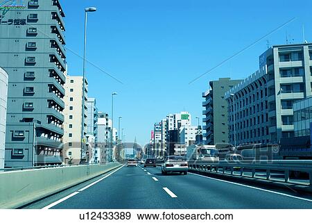 Office buildings and highway, toned image, Tokyo prefecture, Japan View Large Photo Image Stock Photo - Office buildings and highway, toned image, Tokyo prefecture, Japan. Fotosearch