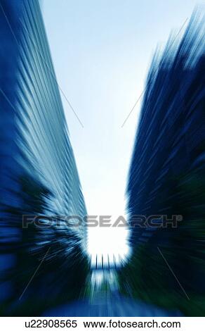 Stock Photography - Office buildings, blurred motion, Tokyo prefecture, Japan. Fotosearch