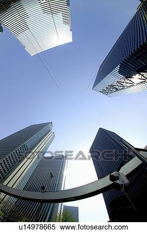 Office buildings under blue sky, fish-eye lens, Tokyo prefecture, Japan View Large Photo Image Stock Photography - Office buildings under blue sky, fish-eye lens, Tokyo prefecture, Japan. Fotosearch