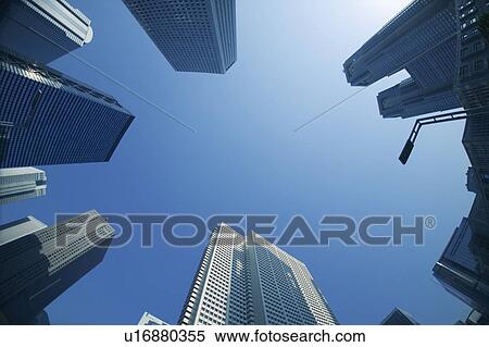 Stock Photography - Office buildings under blue sky, Tokyo prefecture, Japan. Fotosearch