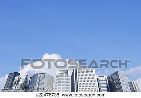 Office buildings under sky, copy space, Tokyo prefecture, Japan View Large Photo Image Stock Photo - Office buildings under sky, copy space, Tokyo prefecture, Japan. Fotosearch