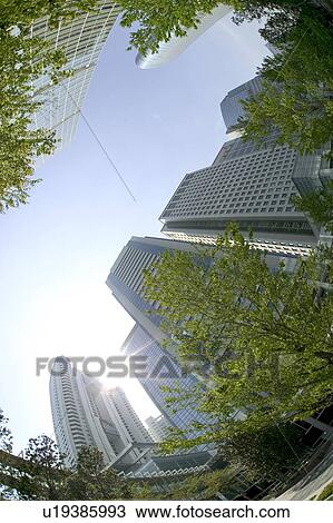 Office buildings under sky, fish-eye lens, lens flare, Tokyo prefecture, Japan View Large Photo Image Stock Image - Office buildings under sky, fish-eye lens, lens flare, Tokyo prefecture, Japan. Fotosearch