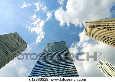 Stock Photo - Office buildings under sky, Tokyo prefecture, Japan. Fotosearch