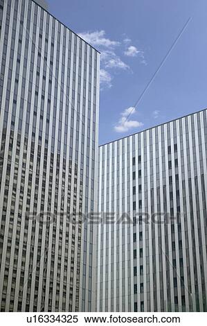 Stock Photography - Office buildings under sky, Tokyo prefecture, Japan. Fotosearch