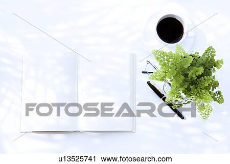 Opened book and cup of coffee, white background View Large Photo Image Stock Image - Opened book and cup of coffee, white background. Fotosearch