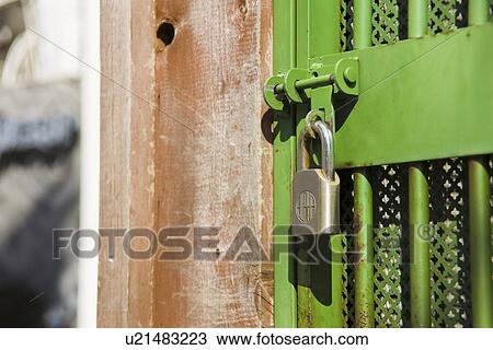 Padlock on gate, close up View Large Photo Image Stock Image - Padlock on gate, close up. Fotosearch