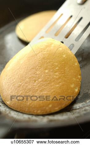 Stock Photo - Pancakes and spatula. Fotosearch