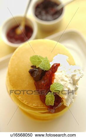Stock Image - Pancakes in a stack, high angle view. Fotosearch