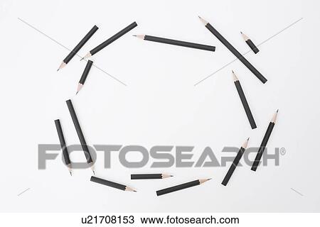 Stock Image - Pencils making frame on white background. Fotosearch