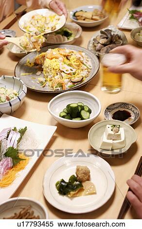 People eating Japanese food View Large Photo Image Stock Photography - People eating Japanese food. Fotosearch