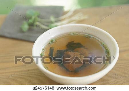 Stock Photo - Pickled Plum Soup in Bowl. Fotosearch