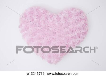 Stock Photograph - Pink flowers in heart shape. Fotosearch