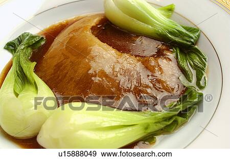 Stock Photo - Plate of cooked shark's fin, close up. Fotosearch