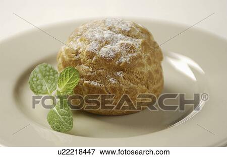 Plate of cream puff, close up, white background View Large Photo Image Stock Photo - Plate of cream puff, close up, white background. Fotosearch