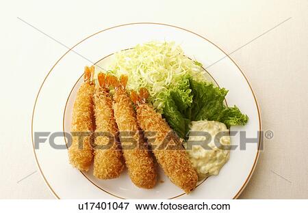 Plate of deep fried prawns, white background View Large Photo Image Stock Photo - Plate of deep fried prawns, white background. Fotosearch