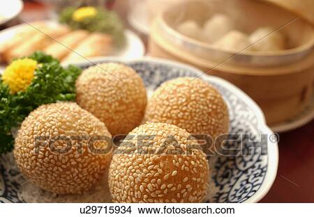 Picture - Plate of fried dumplings, close up. Fotosearch