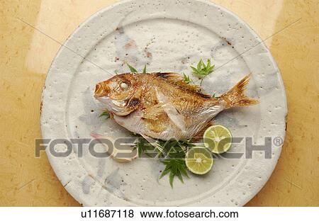 Plate of grilled sea bream View Large Photo Image Stock Photo - Plate of grilled sea bream. Fotosearch
