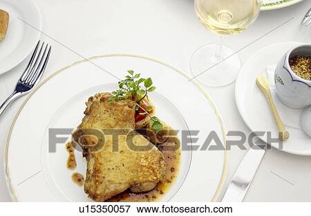 Plate of roasted chicken, white background View Large Photo Image Stock Photo - Plate of roasted chicken, white background. Fotosearch