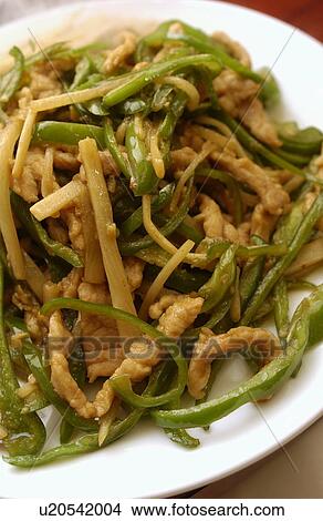 Picture - Plate of stir-fried beef and bell peppers, close up. Fotosearch