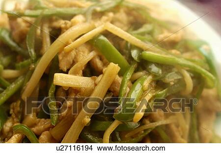 Picture - Plate of stir-fried beef and bell peppers, close up. Fotosearch