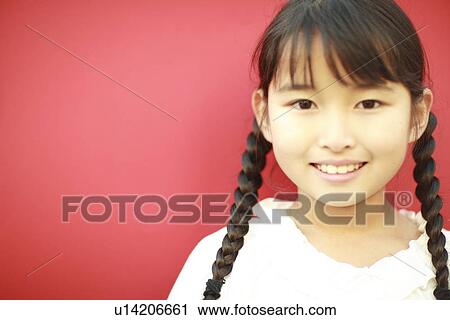 Stock Image - Portrait of a girl. Fotosearch
