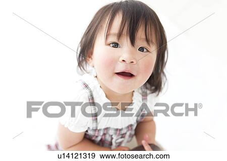 Stock Photo - Portrait of baby girl. Fotosearch