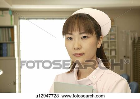 Portrait of female nurse View Large Photo Image Stock Photo - Portrait of female nurse. Fotosearch