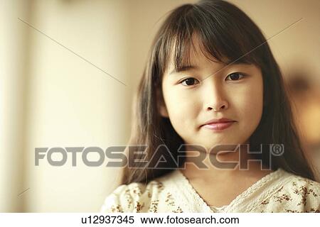 Stock Photography - Portrait of girl, close up, differential focus, Kobe city, Hyogo prefecture, Japan. Fotosearch