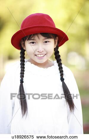 Portrait of girl in red hat, Kobe city, Hyogo prefecture, Japan View Large Photo Image Stock Photography - Portrait of girl in red hat, Kobe city, Hyogo prefecture, Japan. Fotosearch