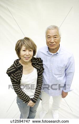 Portrait of mature woman and senior man, smiling, white background View Large Photo Image Stock Photo - Portrait of mature woman and senior man, smiling, white background. Fotosearch