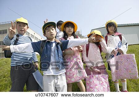Portrait of school children at riverbank View Large Photo Image Stock Photo - Portrait of school children at riverbank. Fotosearch