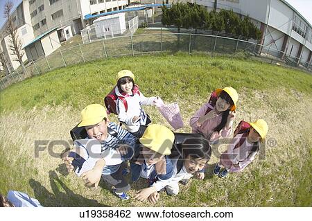 Portrait of school children at riverbank, fish-eye lens View Large Photo Image Stock Image - Portrait of school children at riverbank, fish-eye lens. Fotosearch