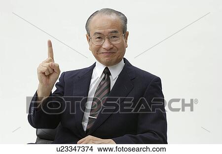 Portrait of Senior Man in Business Suit, Holding Up An Index Finger View Large Photo Image Picture - Portrait of Senior Man in Business Suit, Holding Up An Index Finger. Fotosearch