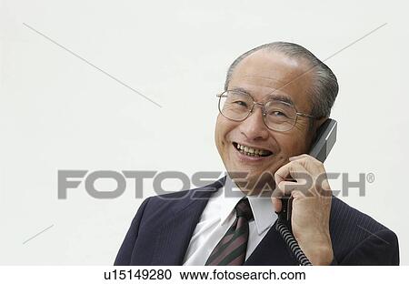 Portrait of Senior Man in Business Suit, Talking on Telephone View Large Photo Image Stock Image - Portrait of Senior Man in Business Suit, Talking on Telephone. Fotosearch