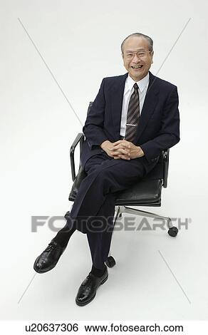 Stock Photograph - Portrait of Senior Man in Business Suit. Fotosearch