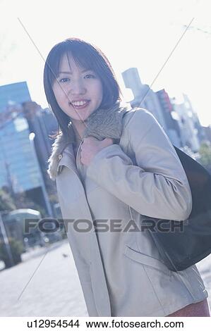 Portrait of young woman View Large Photo Image Picture - Portrait of young woman. Fotosearch