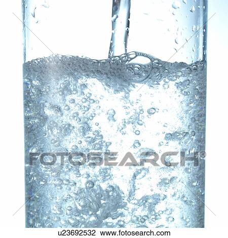 Pouring Carbonated Water into Glass View Large Photo Image Stock Image - Pouring Carbonated Water into Glass. Fotosearch