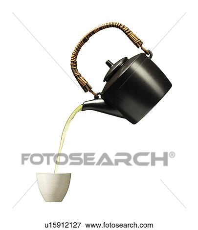 Stock Photo - Pouring green tea into tea cup. Fotosearch