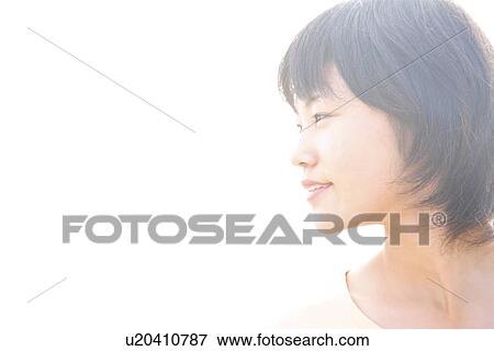 Stock Photo - Profile of young woman, Toyama Prefecture, Honshu, Japan. Fotosearch