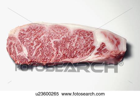 Stock Photography - Raw beef steak, white background. Fotosearch