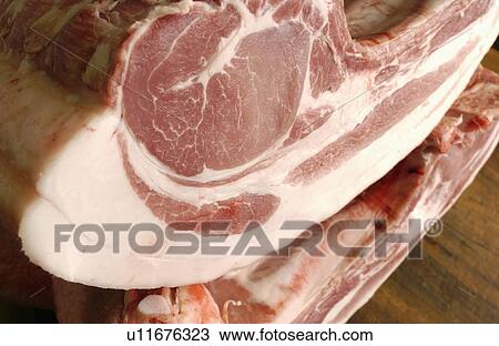 Stock Image - Raw pork ribs, close up. Fotosearch