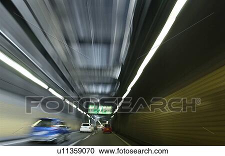 Stock Image - Road tunnel, blurred motion, Tokyo prefecture, Kanagawa prefecture, Japan. Fotosearch