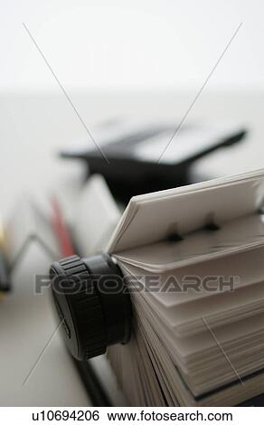 Rotary card file on desk, close up, differential focus View Large Photo Image Stock Photograph - Rotary card file on desk, close up, differential focus. Fotosearch