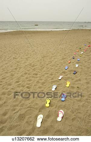Sandals placed in lines on beach, Kamakura city, Kanagawa prefecture, Japan View Large Photo Image Stock Image - Sandals placed in lines on beach, Kamakura city, Kanagawa prefecture, Japan. Fotosearch
