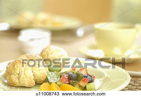 Stock Image - Scone and fruits. Fotosearch